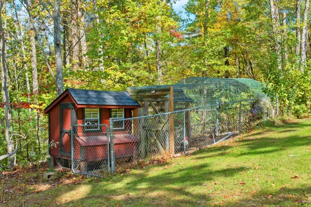 a backyard of a house with lots of green space