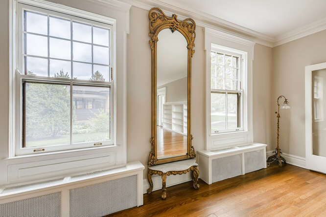 321 North Delaplaine Road Riverside, IL 60546 - Photo 11 of 52 a bathroom with a tub and a window