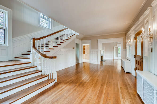 321 North Delaplaine Road Riverside, IL 60546 - Photo 14 of 52 a view of an entryway with wooden floor and stairs