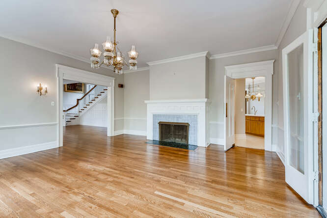 321 North Delaplaine Road Riverside, IL 60546 - Photo 17 of 52 a view of a room with wooden floor fireplace and windows