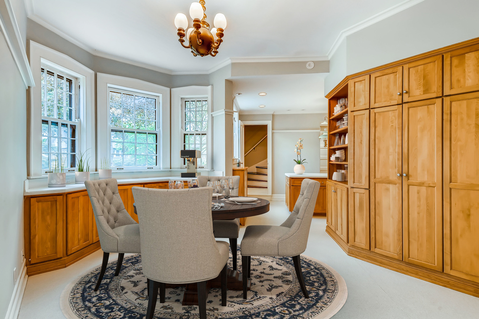 321 North Delaplaine Road Riverside, IL 60546 - Photo 18 of 52 a dining room with furniture a chandelier and wooden floor