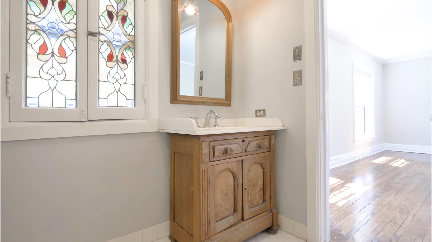 321 North Delaplaine Road Riverside, IL 60546 - Photo 34 of 52 a bathroom with a sink a vanity and a mirror