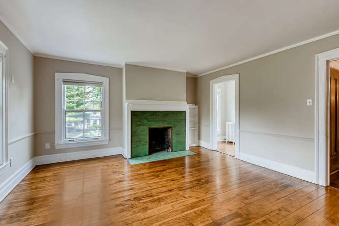 321 North Delaplaine Road Riverside, IL 60546 - Photo 36 of 52 a view of an empty room with window and fire place