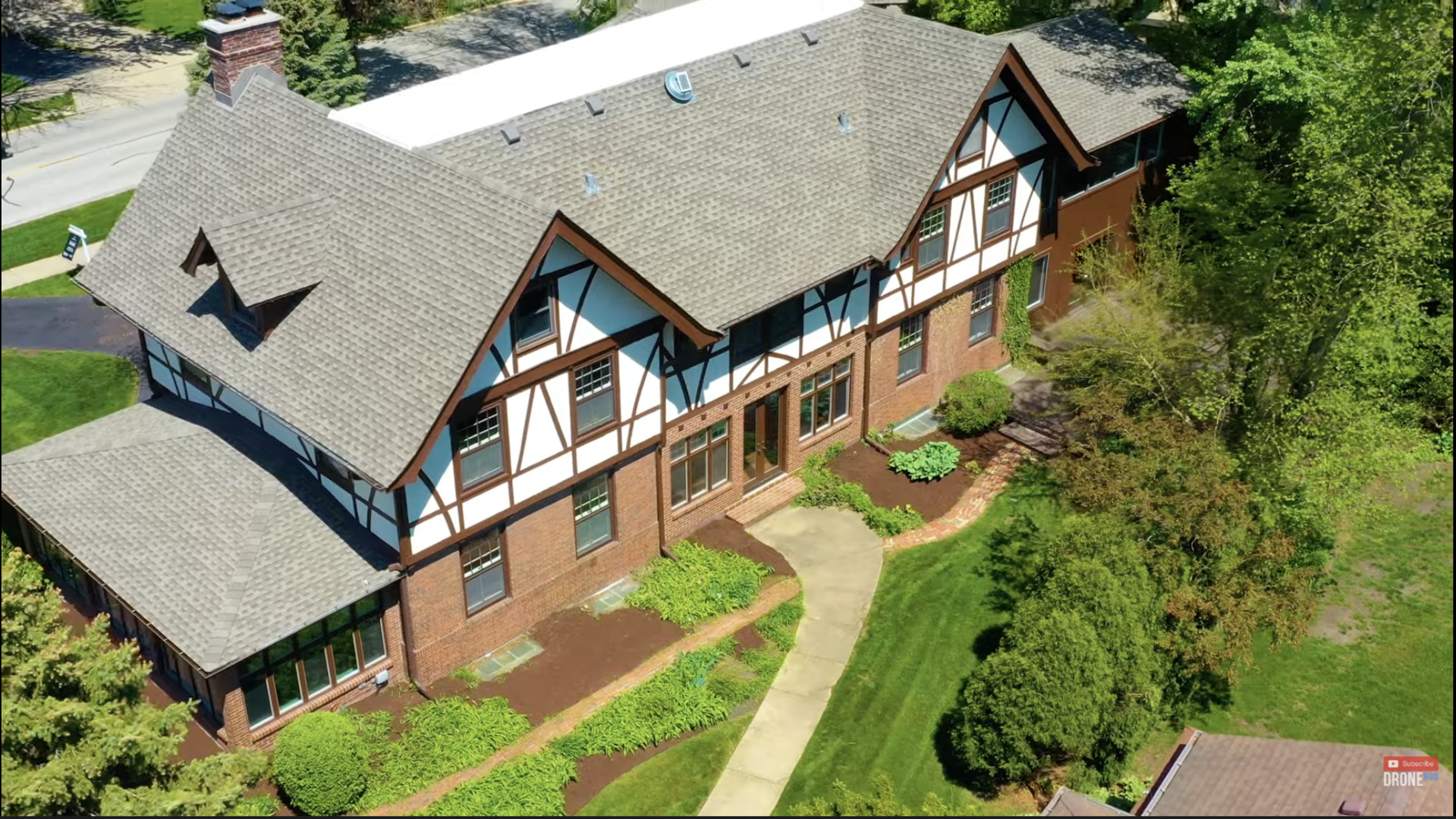 321 North Delaplaine Road Riverside, IL 60546 - Photo 5 of 52 an aerial view of a house with swimming pool
