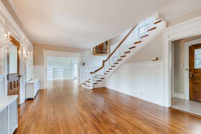 321 North Delaplaine Road Riverside, IL 60546 - Photo 6 of 52 a view of entryway with wooden floor