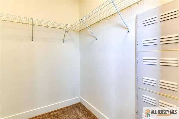 a view of a room with racks on the wall