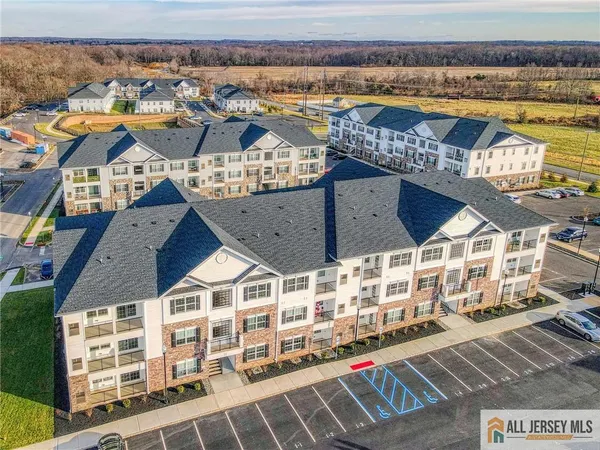 a picture of a building with a ocean view