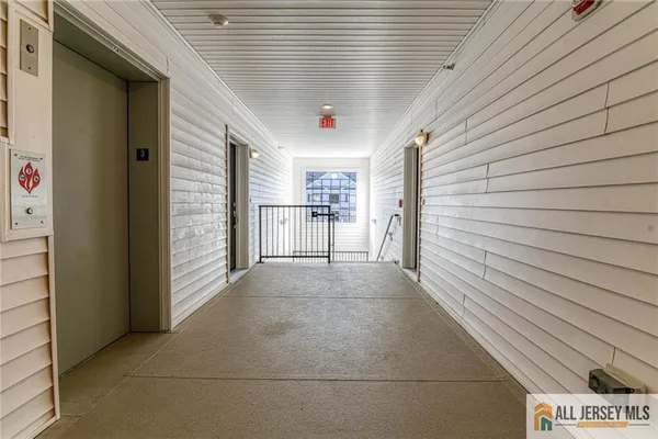 a view of a street with cars