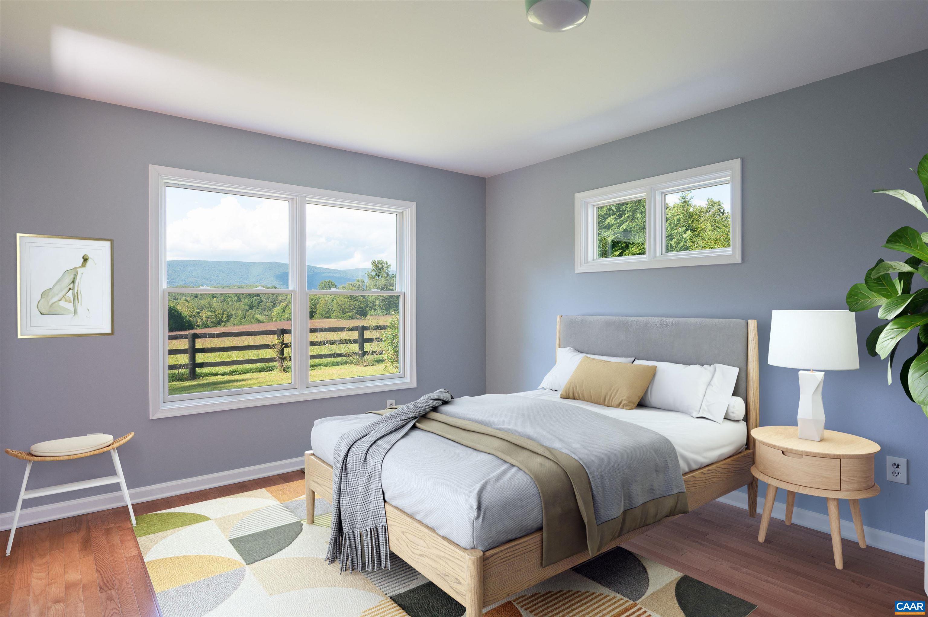 8165 Open Gate Lane Afton, VA 22920 - Photo 13 of 39 a bedroom with a bed and a chair