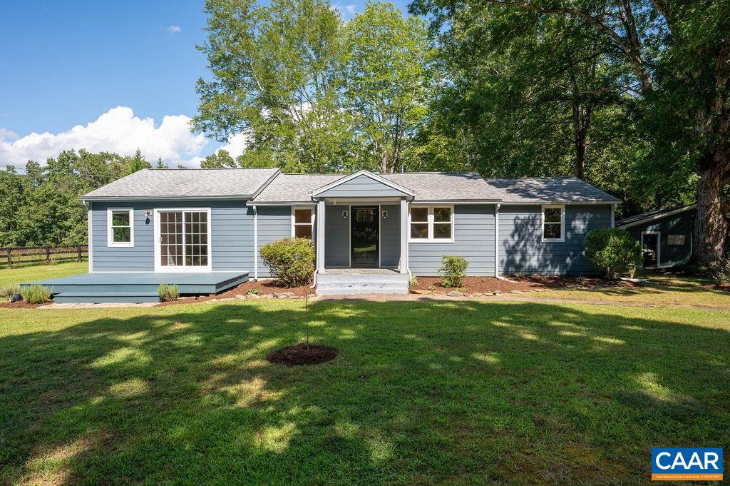 8165 Open Gate Lane Afton, VA 22920 - Photo 2 of 39 a front view of a house with a garden