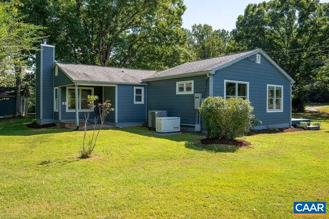 a view of a house with swimming pool