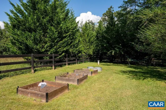 a view of swimming pool with chairs
