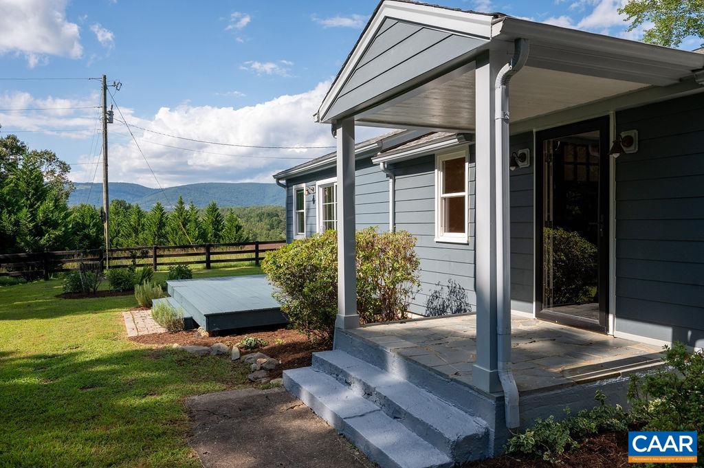 8165 Open Gate Lane Afton, VA 22920 - Photo 3 of 39 a view of a back yard of the house and a garden