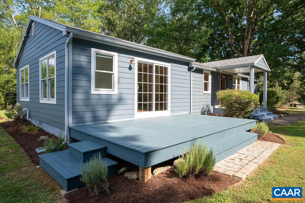 8165 Open Gate Lane Afton, VA 22920 - Photo 4 of 39 a view of house with backyard space and sitting area