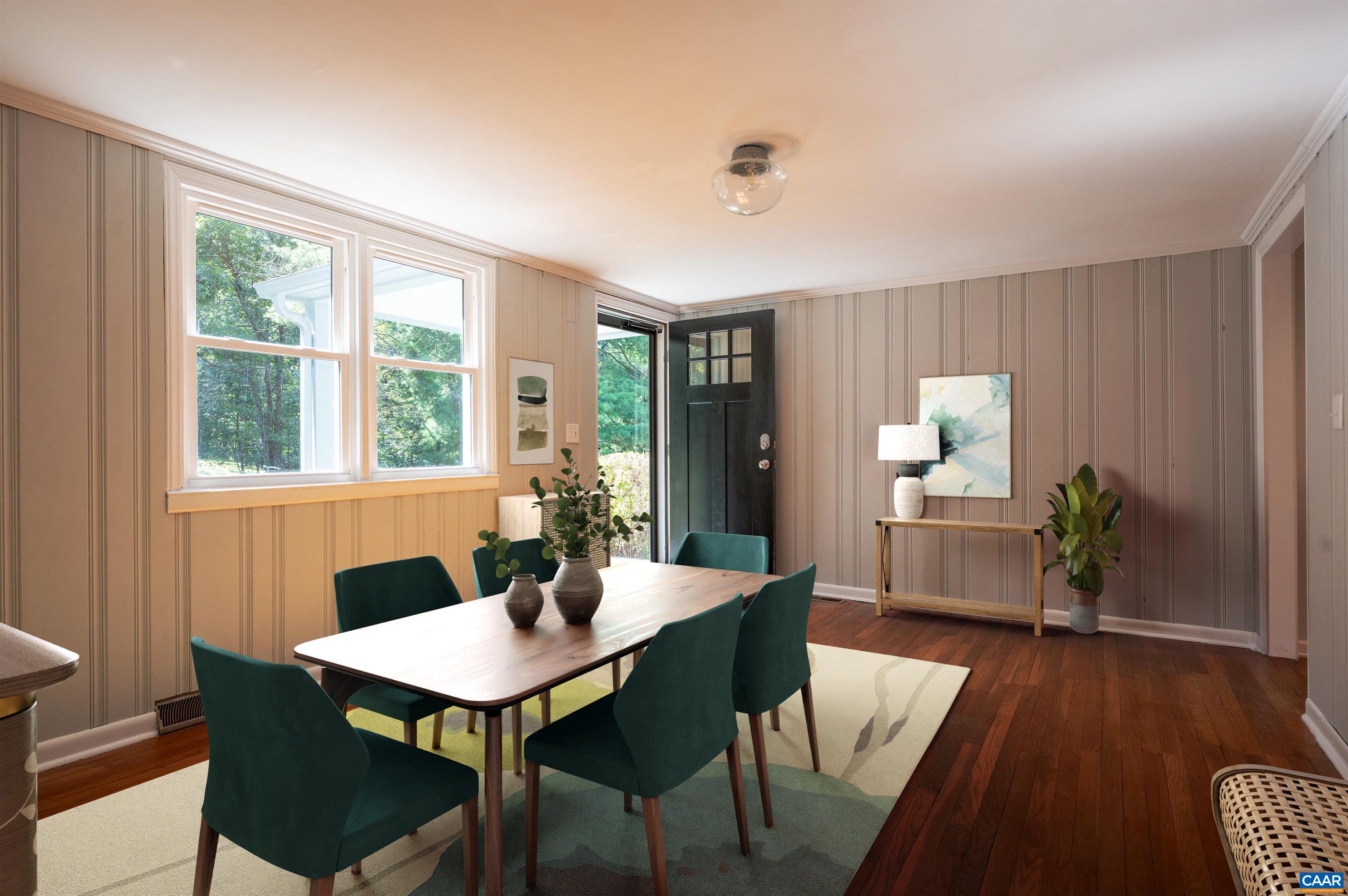 8165 Open Gate Lane Afton, VA 22920 - Photo 6 of 39 a view of a dining room with furniture window and wooden floor