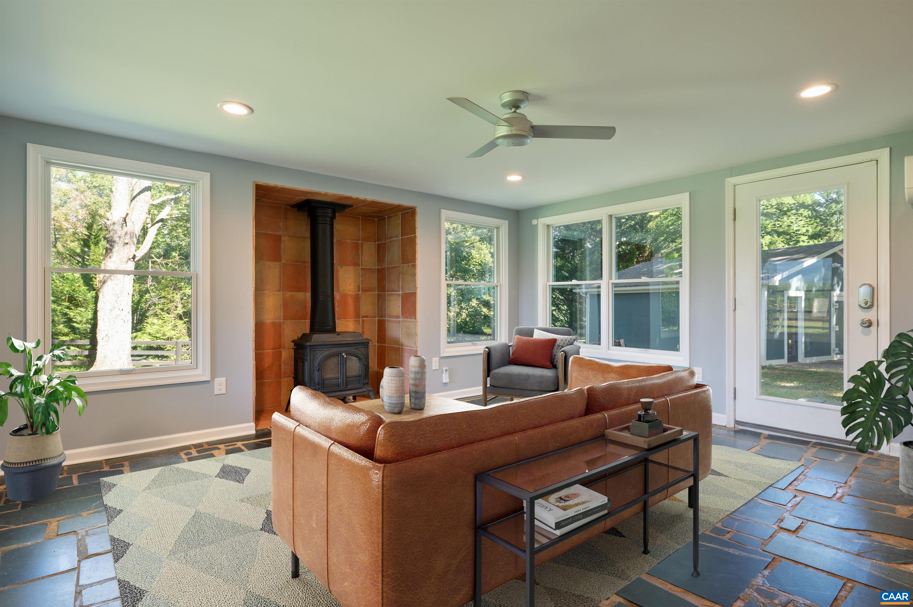 8165 Open Gate Lane Afton, VA 22920 - Photo 7 of 39 a living room with furniture and a large window