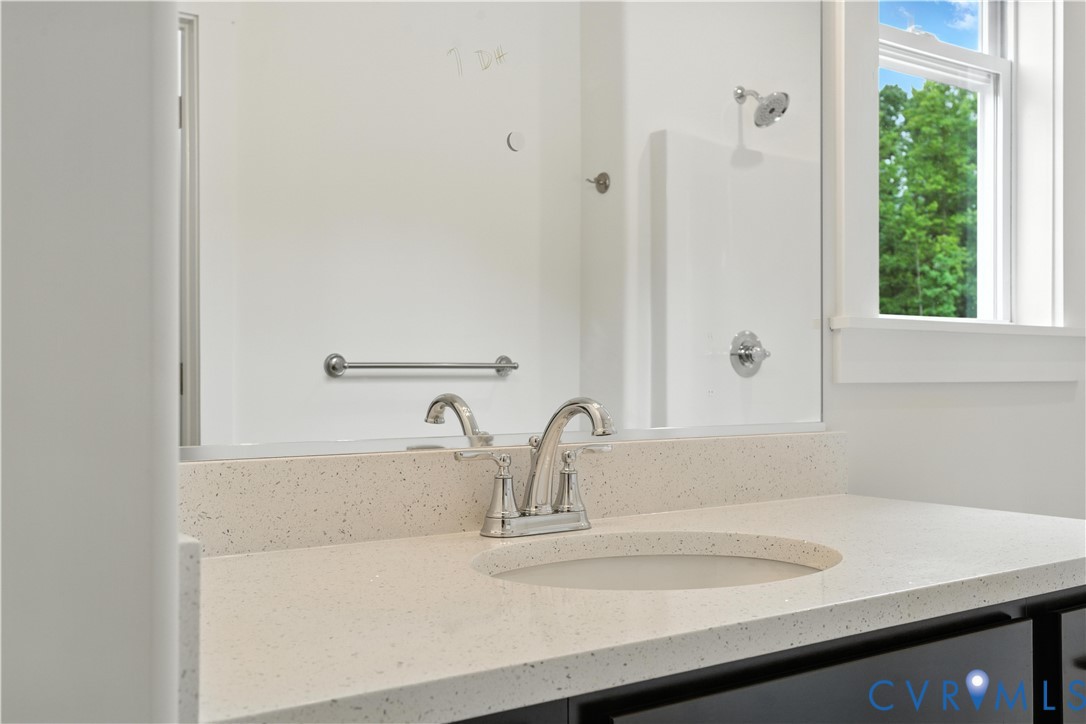 5782 Darlington Heights Road Cullen, VA 23934 - Photo 14 of 21 a bathroom with a sink and a mirror