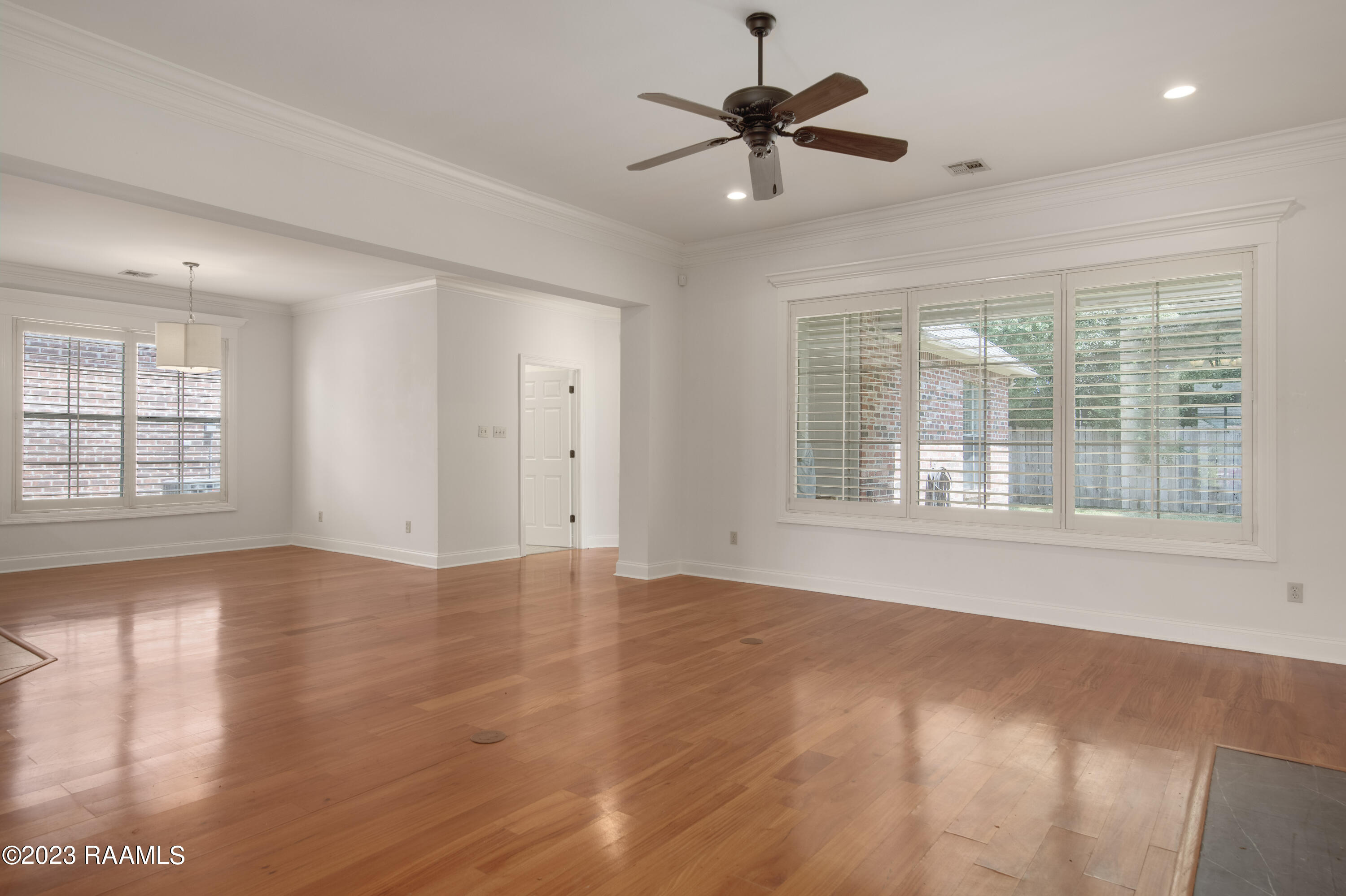 112 Notting Hill Way Lafayette, LA 70508 - Photo 6 of 32 Living room with back wall of windows