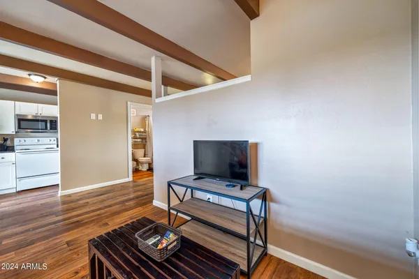 a kitchen with a stove and a microwave