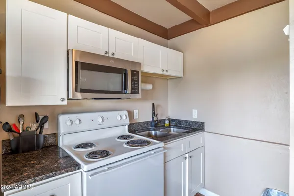 a utility room with washer and dryer