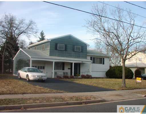 4 Newkirk Road Somerset, NJ 08873 - Photo 1 of 10 a front view of a house with a garden