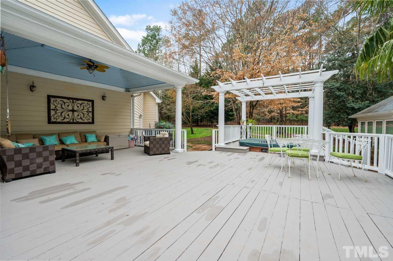 1605 Sharnbrook Court Raleigh, NC 27614 - Photo 11 of 63 a view of a house with a patio