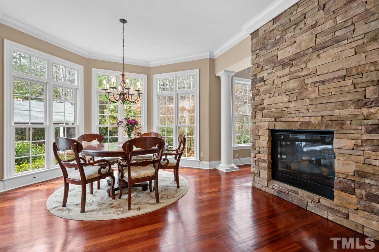 1605 Sharnbrook Court Raleigh, NC 27614 - Photo 25 of 63 a dining room with furniture window wooden floor