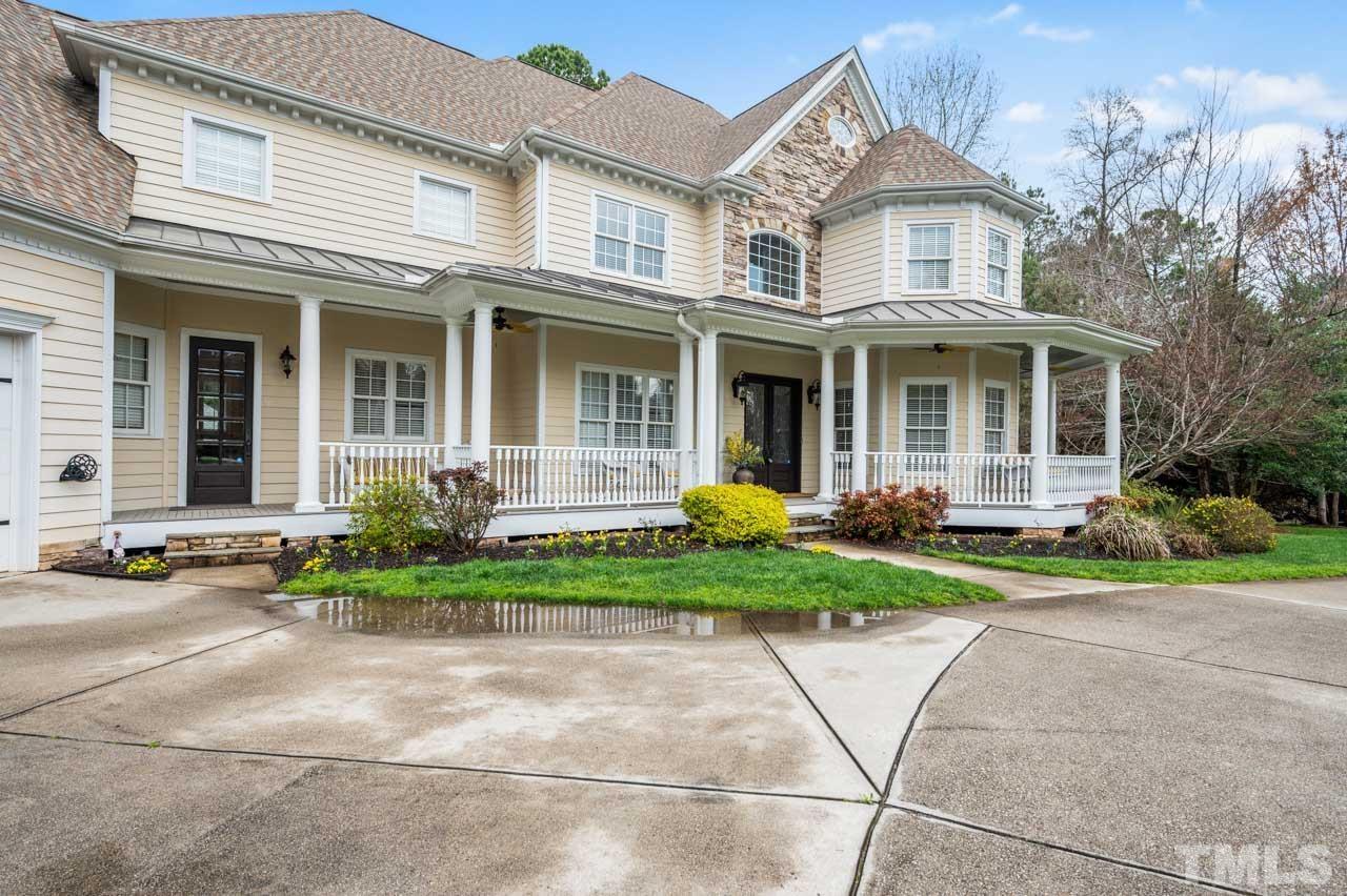 1605 Sharnbrook Court Raleigh, NC 27614 - Photo 3 of 63 a front view of a house with garden