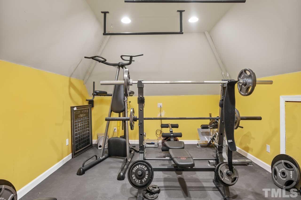 1605 Sharnbrook Court Raleigh, NC 27614 - Photo 63 of 63 a view of a room with gym equipment
