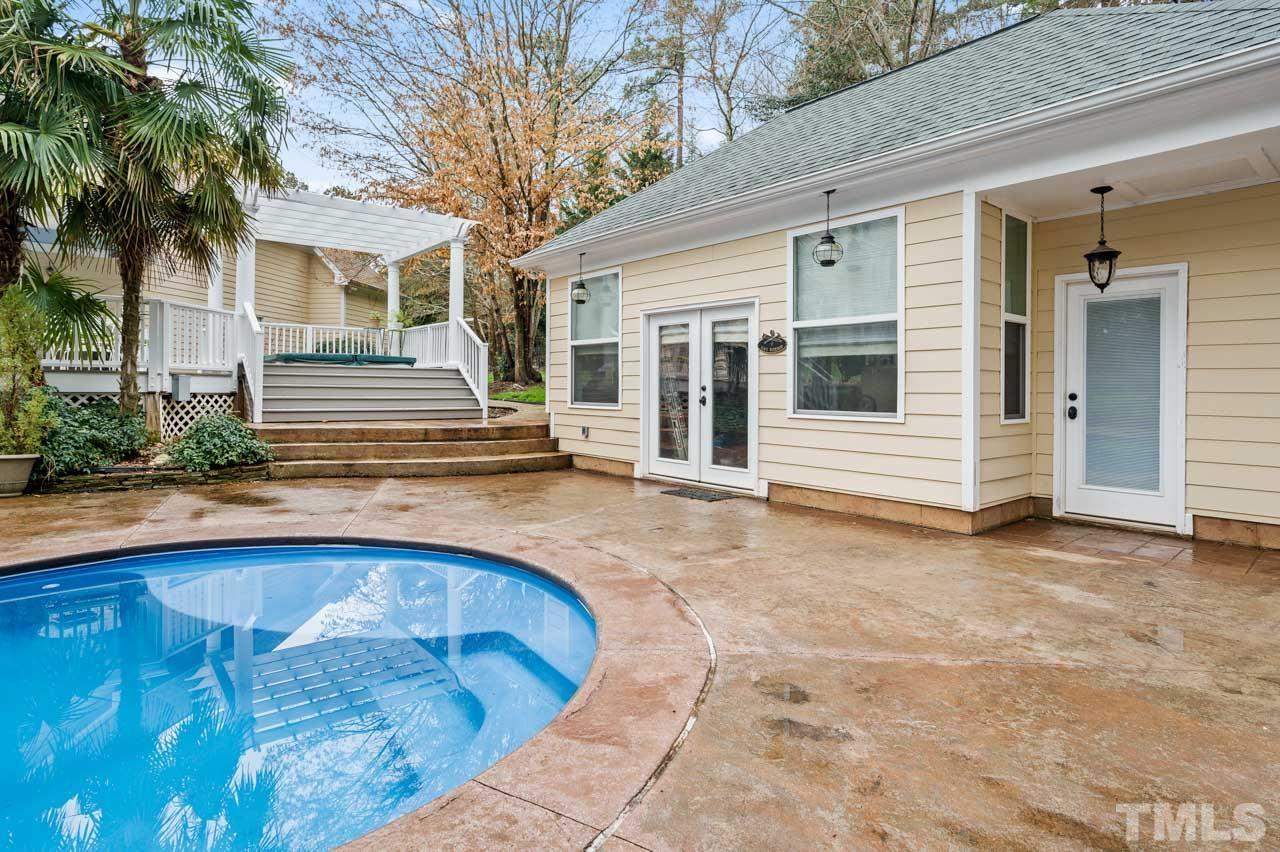1605 Sharnbrook Court Raleigh, NC 27614 - Photo 8 of 63 a view of a house with a patio