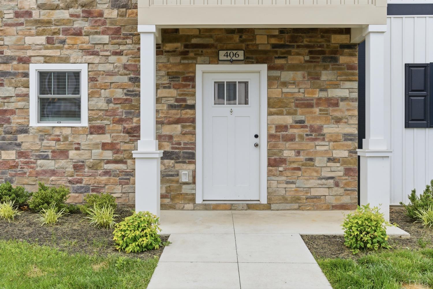 556 Leesville Road, Unit 406 Lynchburg, VA 24502 - Photo 32 of 39 a front view of a house with brick walls