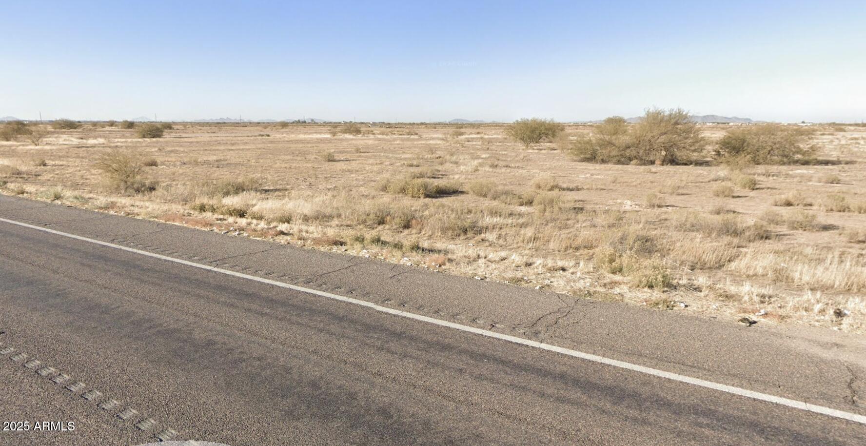 4597 East Cornman Road Eloy, AZ 85131 - Photo 3 of 5 an empty room with mountain view
