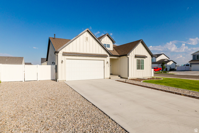 433 North 600 West Smithfield, UT 84335 - Photo 4 of 40 Contemporary exterior with white board-and-batten siding