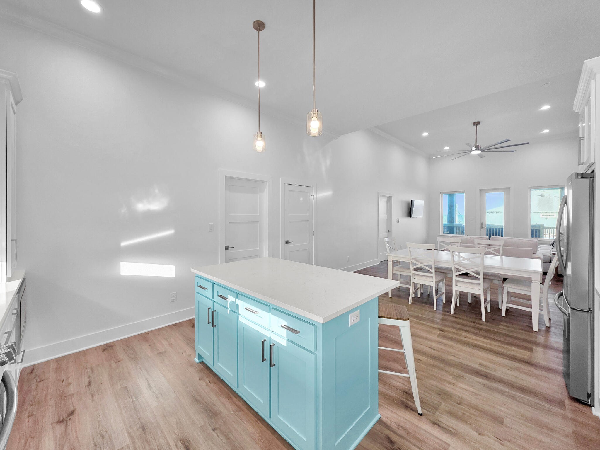 1221 Gulf Road Crystal Beach, TX 77650 - Photo 15 of 48 a large kitchen with a table and chairs