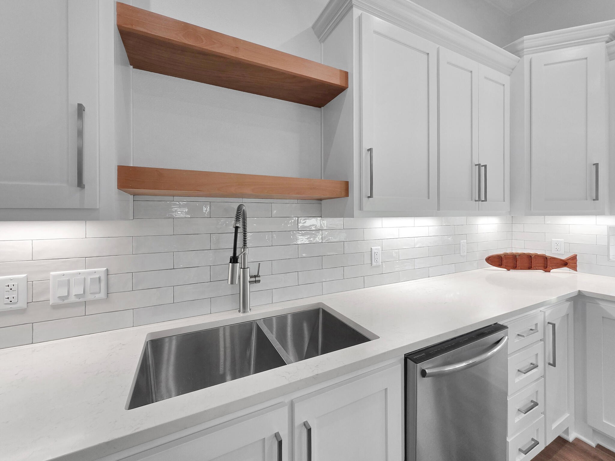 1221 Gulf Road Crystal Beach, TX 77650 - Photo 16 of 48 a kitchen with a sink and cabinets