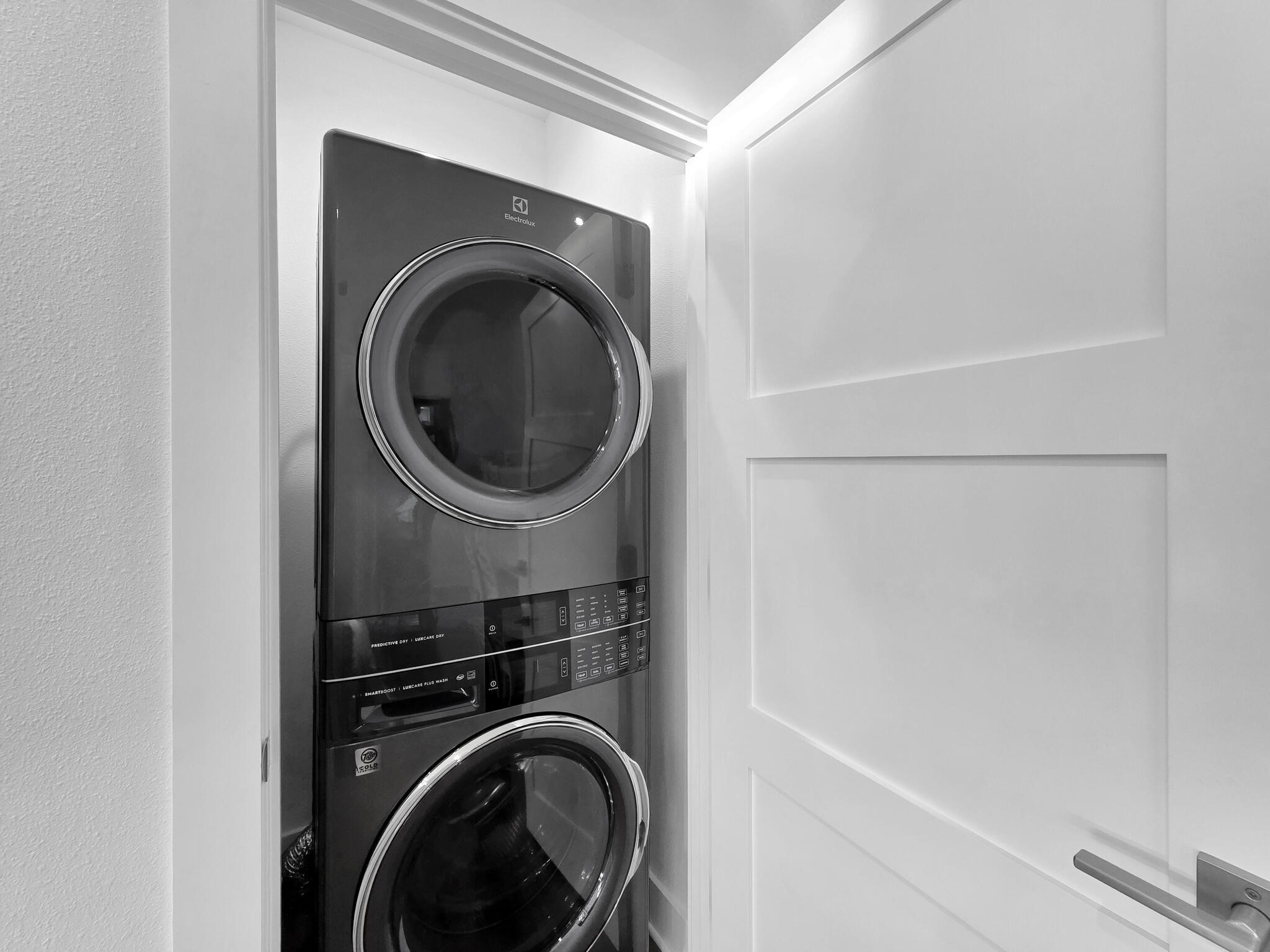1221 Gulf Road Crystal Beach, TX 77650 - Photo 30 of 48 a utility room with dryer and washer