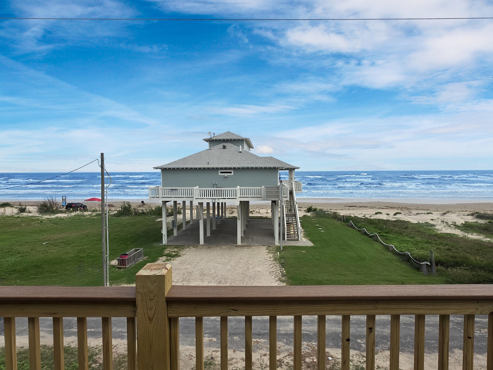 1221 Gulf Road Crystal Beach, TX 77650 - Photo 34 of 48 a view of a two chairs on the roof deck