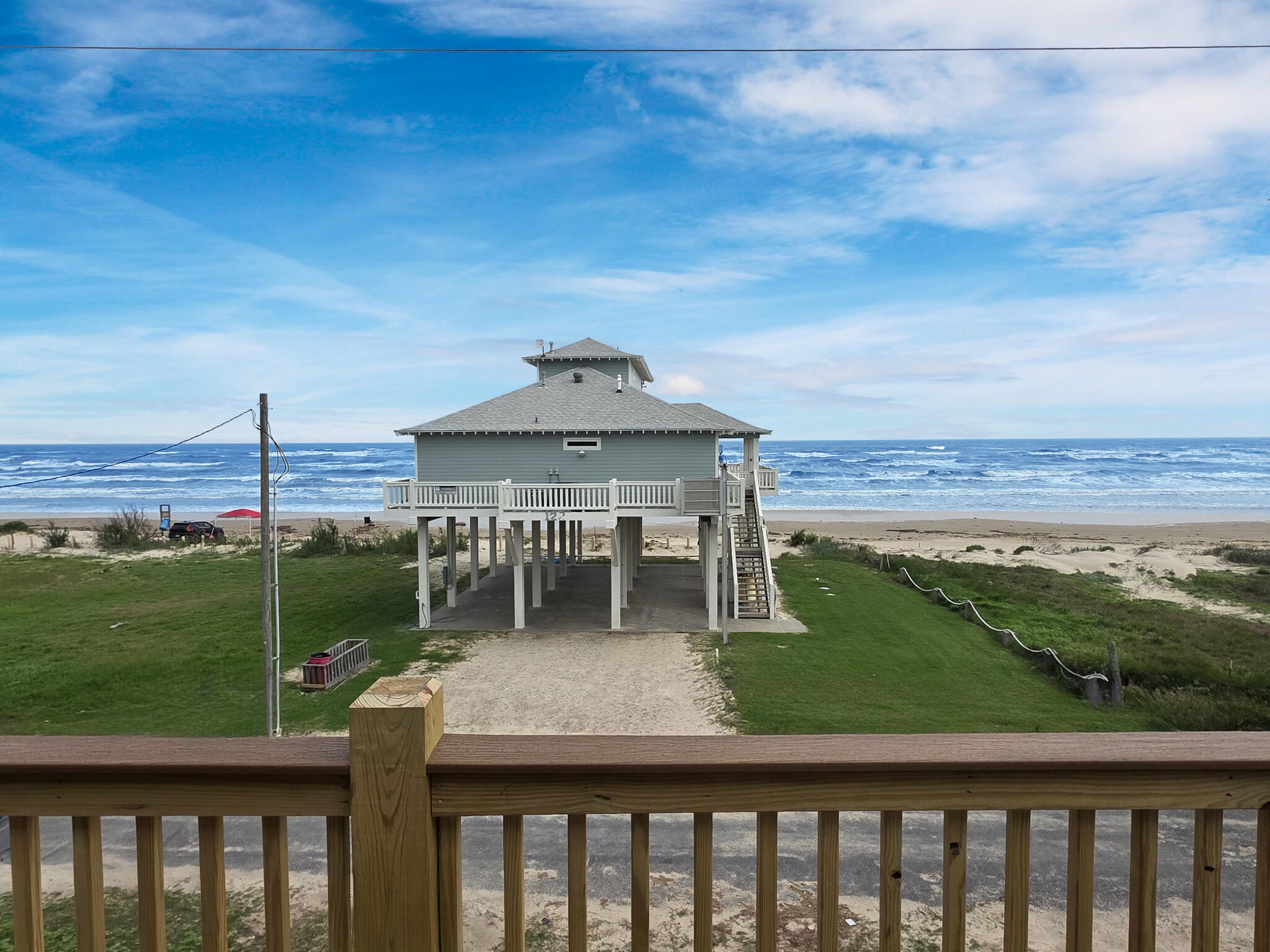 1221 Gulf Road Crystal Beach, TX 77650 - Photo 34 of 48 a view of a two chairs on the roof deck