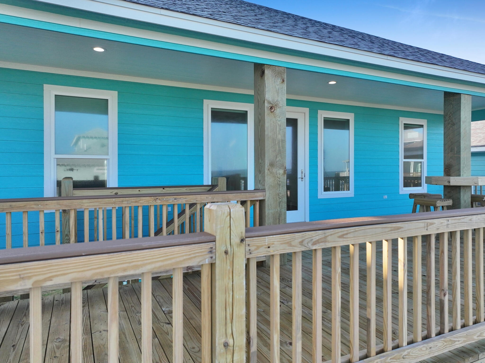 1221 Gulf Road Crystal Beach, TX 77650 - Photo 38 of 48 a view of a brick house with a window