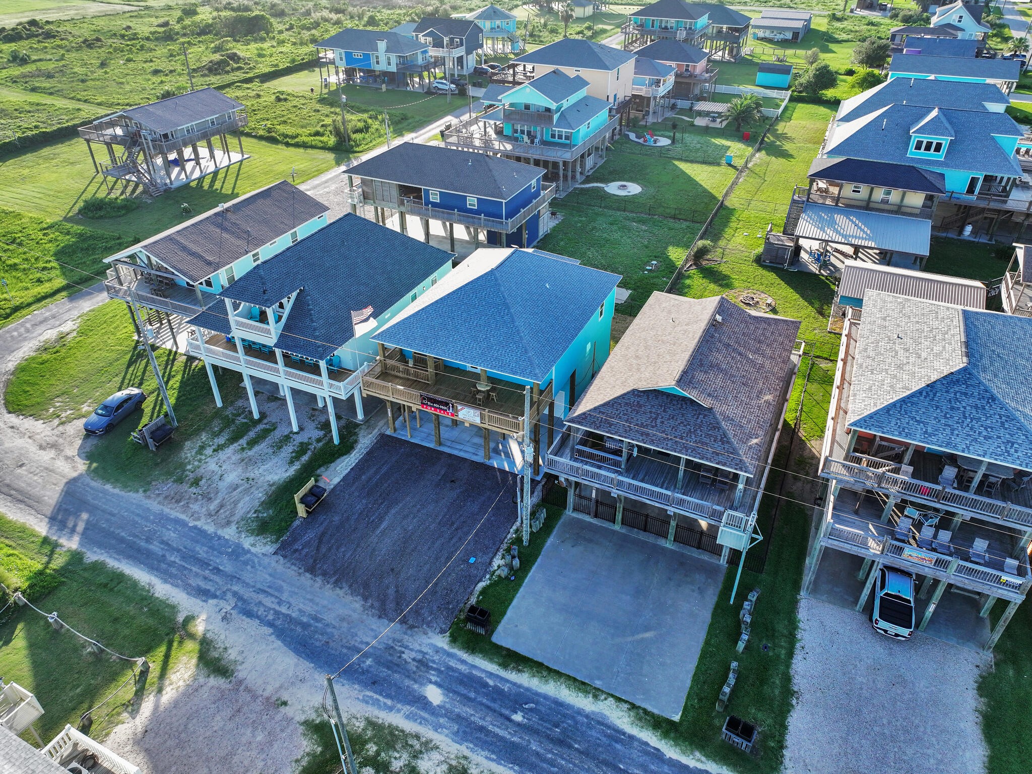 1221 Gulf Road Crystal Beach, TX 77650 - Photo 41 of 48 an aerial view of a chairs and table on the deck