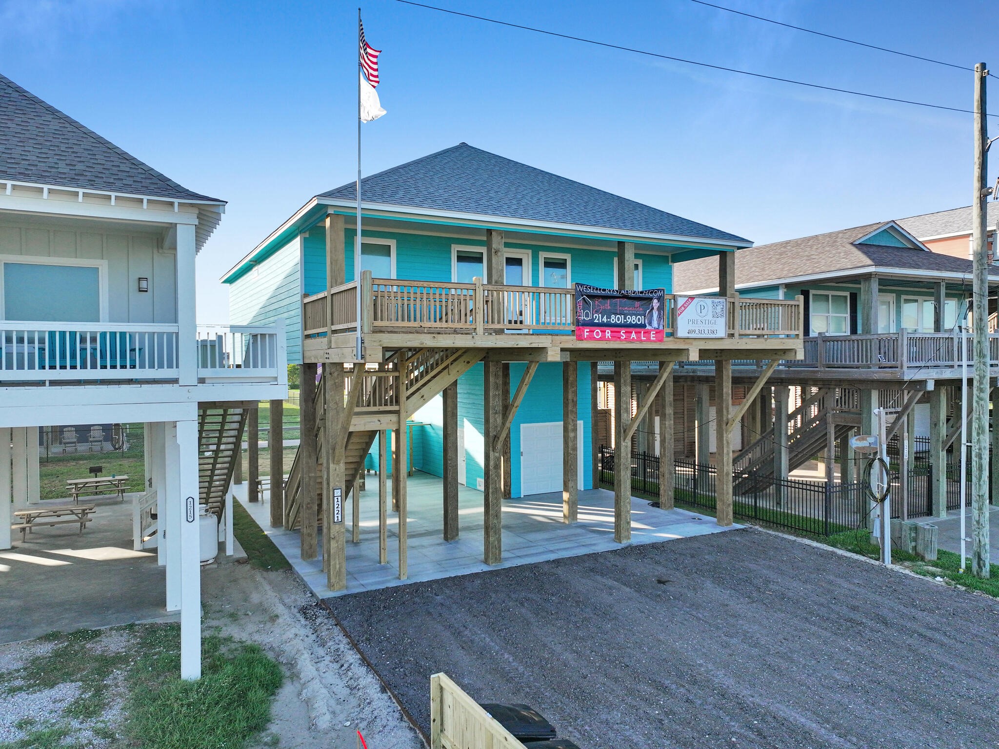 1221 Gulf Road Crystal Beach, TX 77650 - Photo 46 of 48 a view of a house with wooden deck and a porch