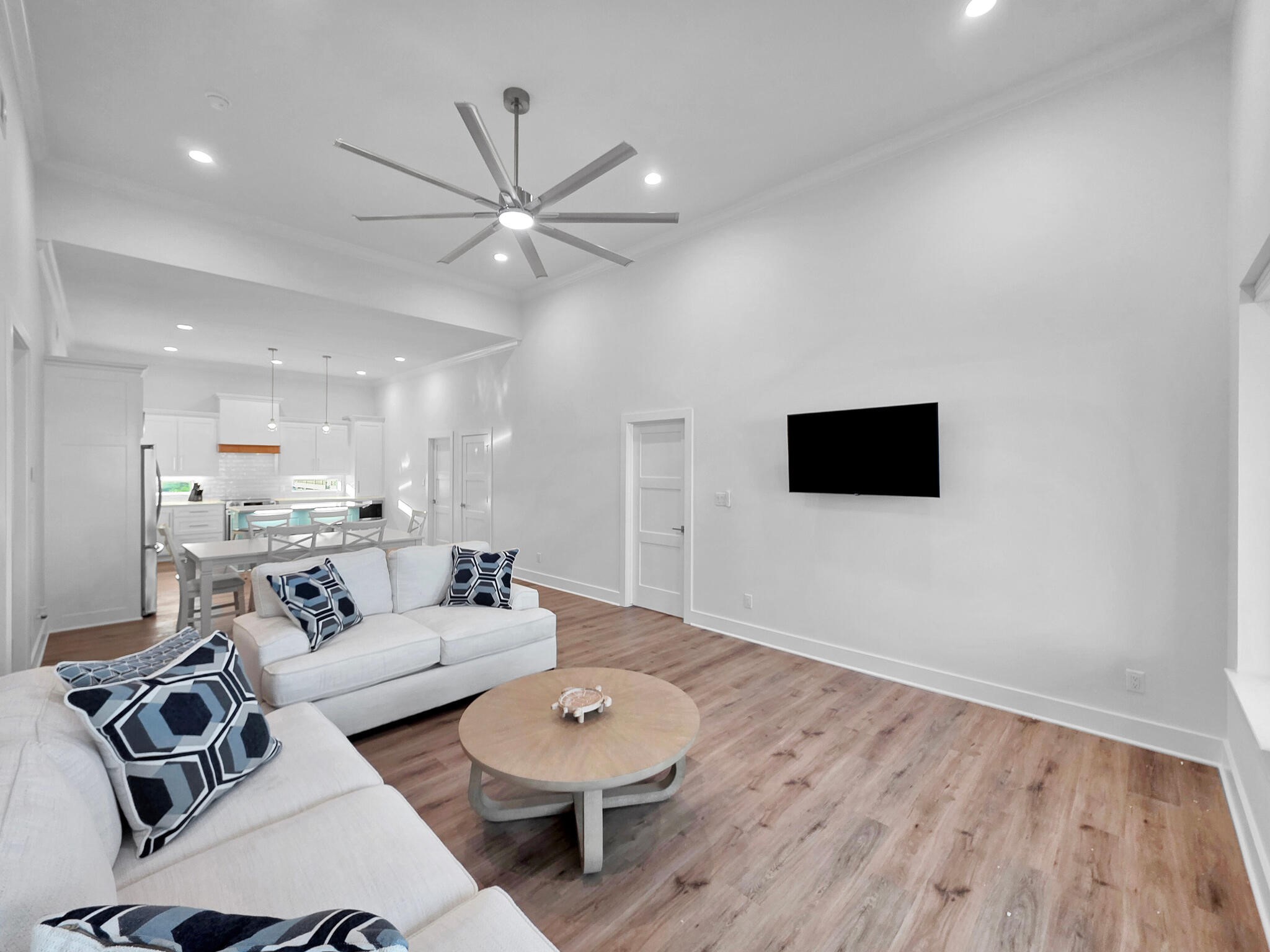 1221 Gulf Road Crystal Beach, TX 77650 - Photo 9 of 48 a living room with furniture and a wooden floor
