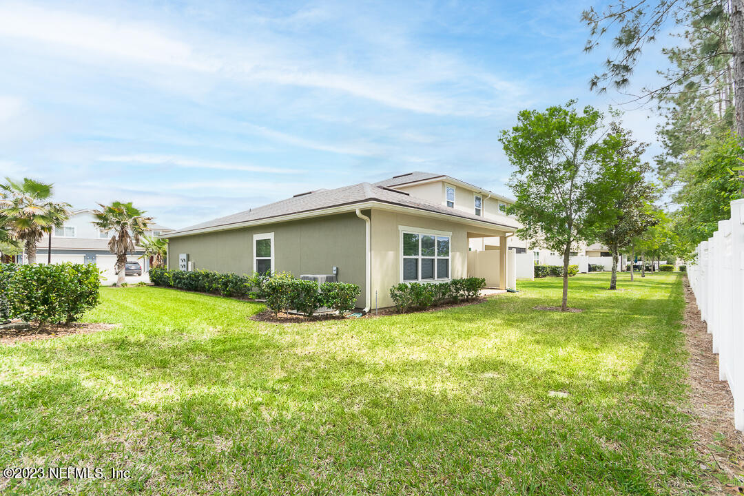 3384 Chestnut Ridge Way Orange Park, FL 32065 - Photo 12 of 12 full side back view