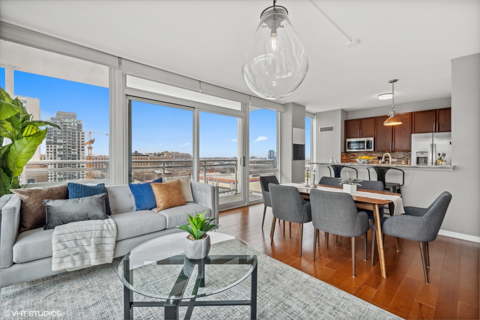 757 North Orleans Street, Unit 1111 Chicago, IL 60654 - Photo 3 of 16 a view of a dining room with furniture window and outside view