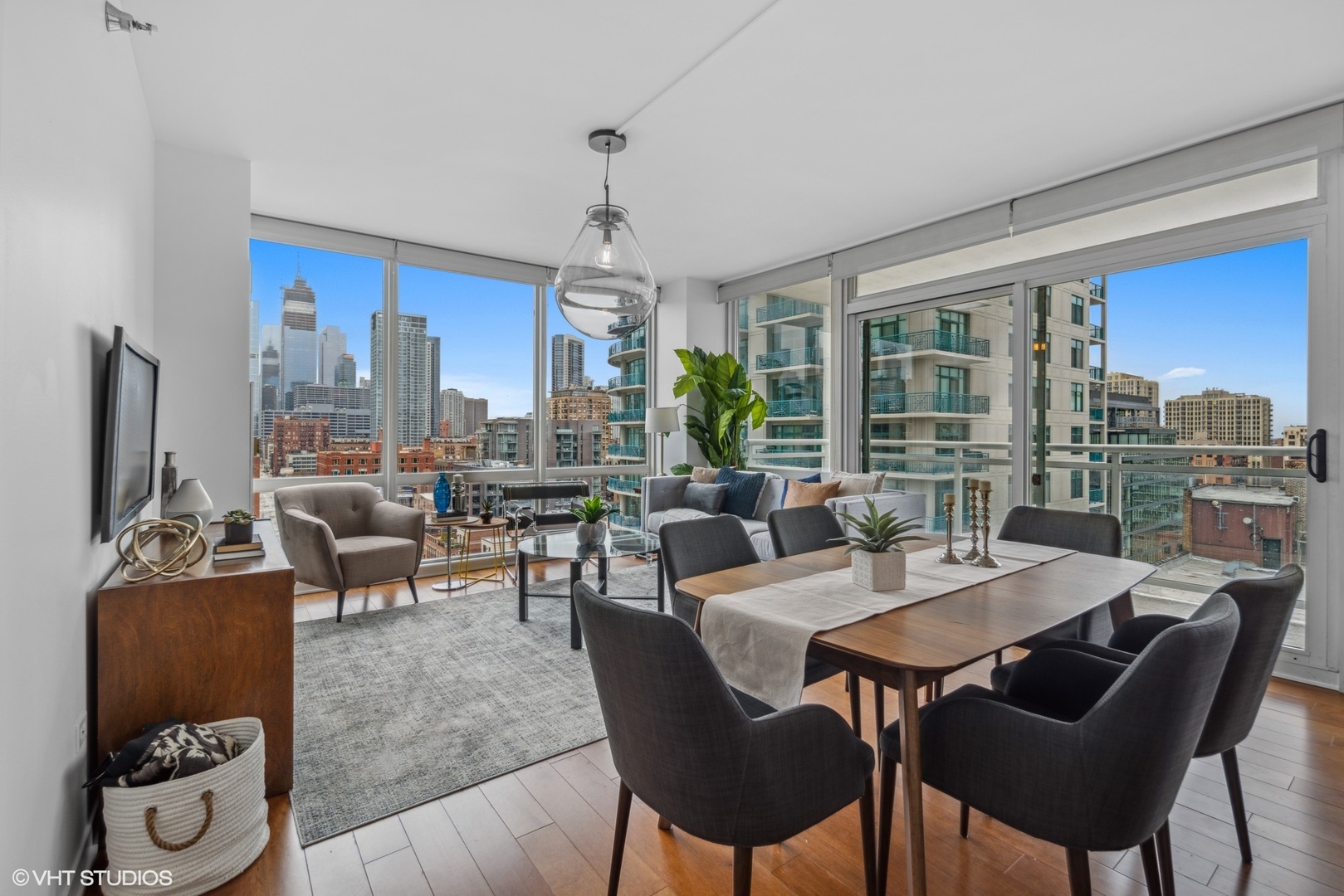 757 North Orleans Street, Unit 1111 Chicago, IL 60654 - Photo 4 of 16 a view of a dining room with furniture window and outside view