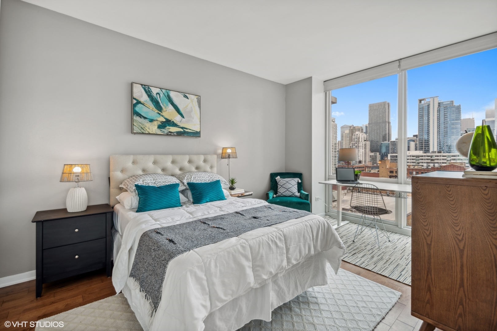 757 North Orleans Street, Unit 1111 Chicago, IL 60654 - Photo 8 of 16 a bedroom with a bed and a couch