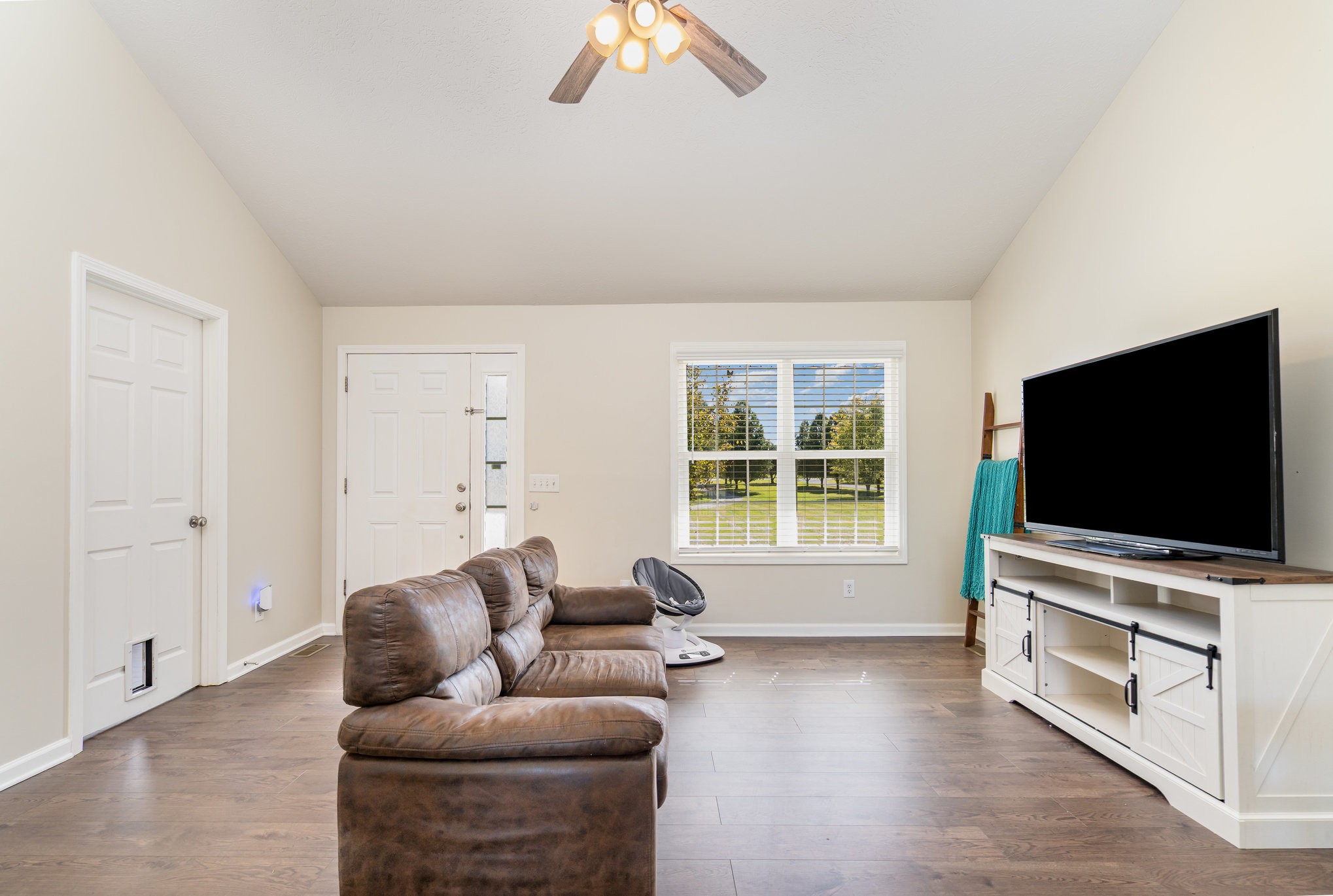 3773 Atkins Road Cedar Hill, TN 37032 - Photo 5 of 29 a living room with furniture and a flat screen tv