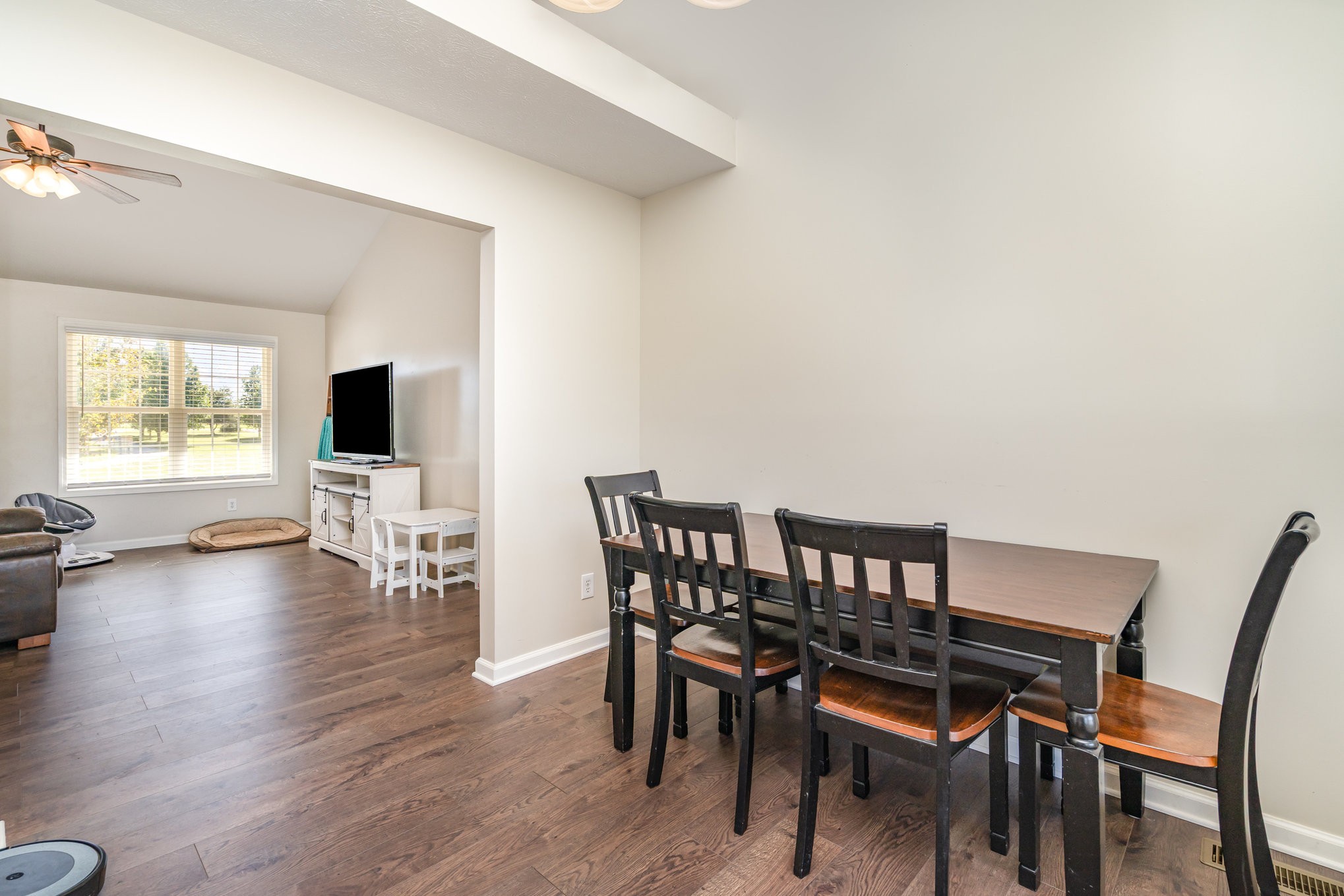 3773 Atkins Road Cedar Hill, TN 37032 - Photo 7 of 29 a view of a dining room with furniture and wooden floor