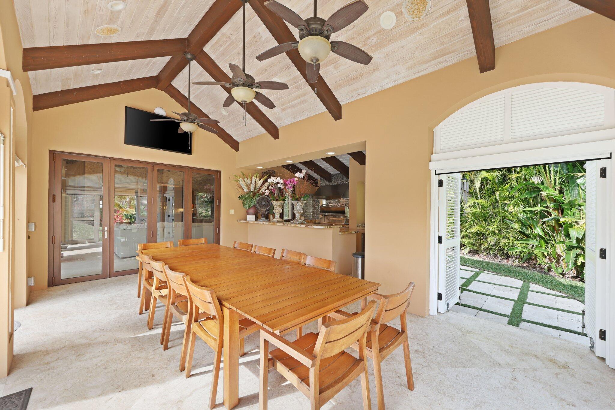 2313 Northwest 59th Street Boca Raton, FL 33496 - Photo 65 of 139 covered outdoor kitchen/dining