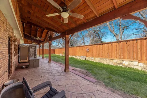 a view of a backyard with garden